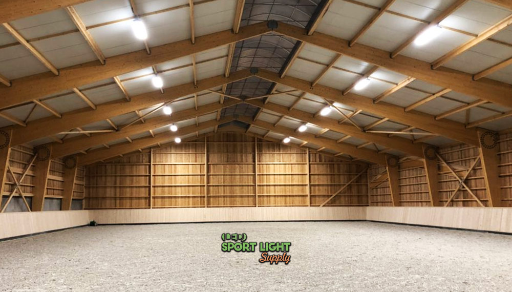 high riding arena ceiling height increases light loss